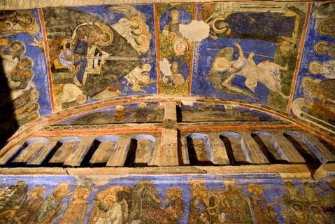 Open Air Museum. The Buckle Church the largest cave church in Goreme. Detail of richly coloured
