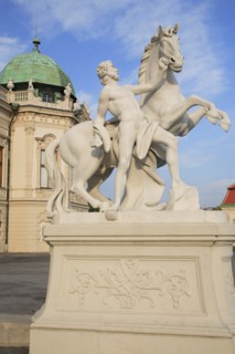 Statue of a horse tamer at Belvedere Palace part seen behind. Photo : Bennett Dean