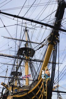 Bow and rigging of Admiral Lord Nelsons flagship HMS Victory showing the ships figurehead in the
