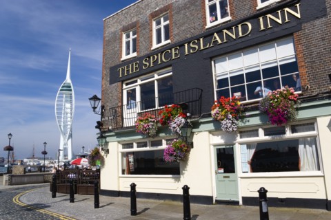 The 170 metre tall Spinnaker Tower and Historic Naval Dockyard seen from Spice Island in Old