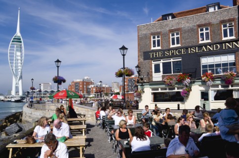 The 170 metre tall Spinnaker Tower and Historic Naval Dockyard seen from Spice Island in Old