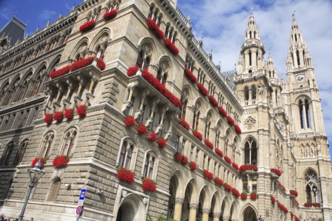 The Rathaus. Angled view of exterior with brightly coloured window boxes. Photo: Bennett Dean