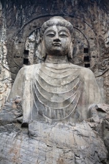 Tang Dynasty Vairocana Buddha Fengxian Temple Longmen Grottoes and Caves. Photo : Mel Longhurst
