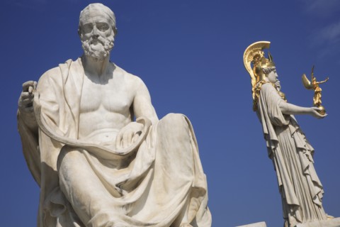 Statues of the Greek historian Polybius and Athena on the right in front of Parliament building.