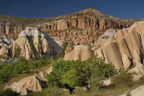 Rose and Red Valleys the Church of the Three Crosses. Rock cut cave church amongst peaks and