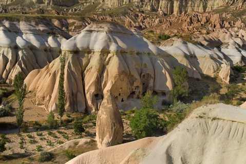 Rose and Red Valleys the Church of the Three Crosses. Rock cut cave church amongst ochre and white