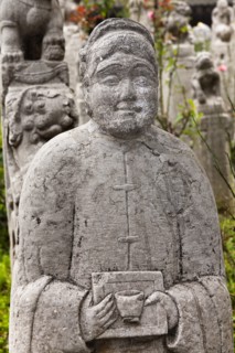 Carved statue of a man in Small Goose Pagoda Park. Photo: Mel Longhurst