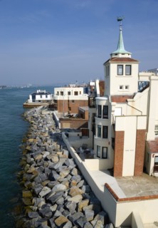 The house with wind vane known as Tower House that the marine artist W L Wyllie kived in on The