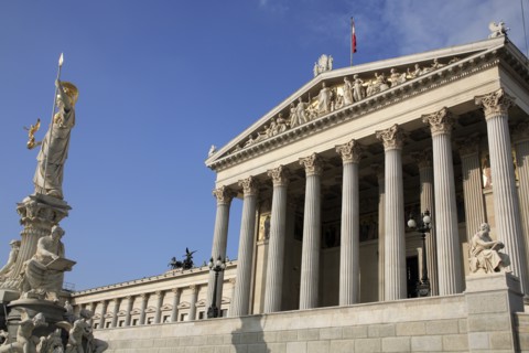 Parliament. Exterior facade with fountain and statue of Athena to the left. Photo: Bennett Dean
