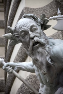 Detail of a figure on the Michaelertrakt the southern gateway into the Hofburg Palace. The statues