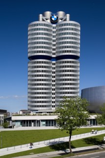 BMW Headquarters exterior with the BMW Tower which stands 101 metres tall and mimics the shape of