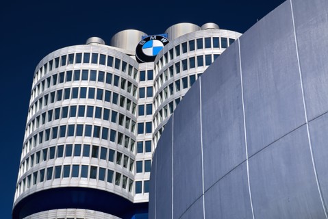 BMW Headquarters exterior. BMW Tower which stands 101 metres tall and mimics the shape of tyres