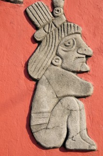 Mexico, Veracruz, Papantla, Detail of relief carving of Totonac figures on the Mural Cultural