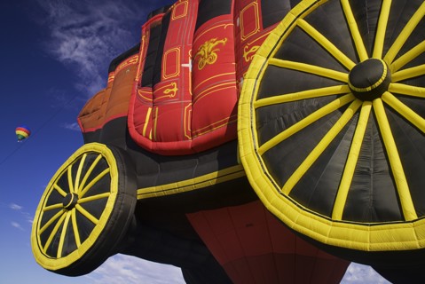 USA, New Mexico, Albuquerque, Annual balloon fiesta colourful hot air balloons. Part view of