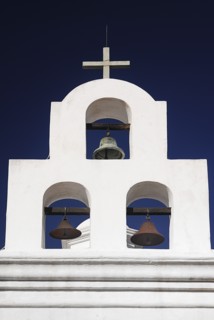 USA, Arizona, Tucson, Mission Church of San Xavier del Bac. White painted bell tower with three
