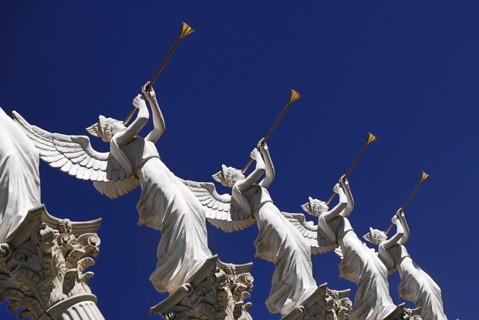 USA, Nevada, Las Vegas, The Strip detail of winged statues outside Caesars Palace hotel and casino.