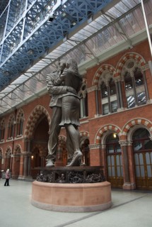 England, London, St Pancras railway station on Euston Road The Meeting Place statue by Paul Day.