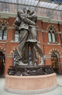 England, London, St Pancras railway station on Euston Road The Meeting Place statue by Paul Day.