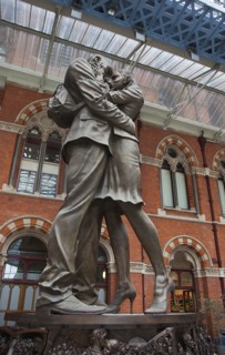 England, London, St Pancras railway station on Euston Road The Meeting Place statue by Paul Day.