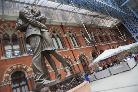 England, London, St Pancras railway station on Euston Road The Meeting Place statue by Paul Day.