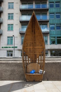 England, London, Vauxhall Albert embankment benches made from wood in the shape of boats. 
Photo :