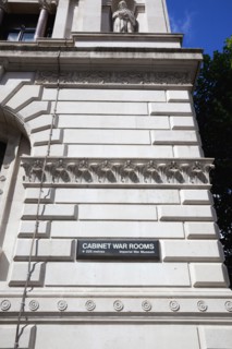 England, London, Westminster Whitehall sign for the Imperial War Museum and the Cabinet War rooms.