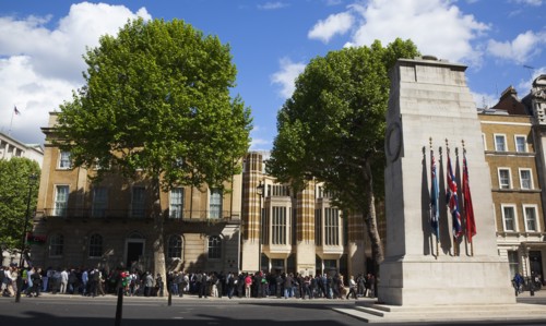England, London, Westminster Whitehall the Cenotaph with protesters outside the Department for