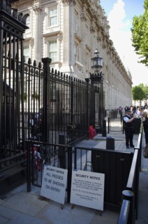 England, London, Westminster Whitehall Downing Street Security gates and armed police guards.