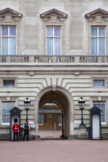 England, London, Westminster Buckingham Palace exterior with both Queens Guard and Metropolitan