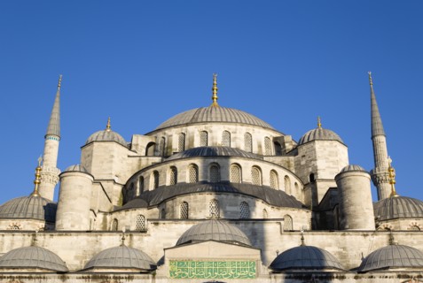 Turkey, Istanbul, Sultanahmet Camii The Blue Mosque domes seen from the Courtyard with Arabic text