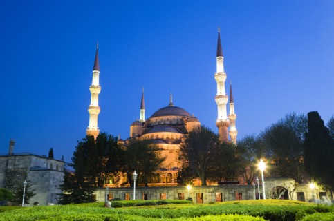 Turkey, Istanbul, Sultanahmet Camii The Blue Mosque domes and minarets at sunset with son et