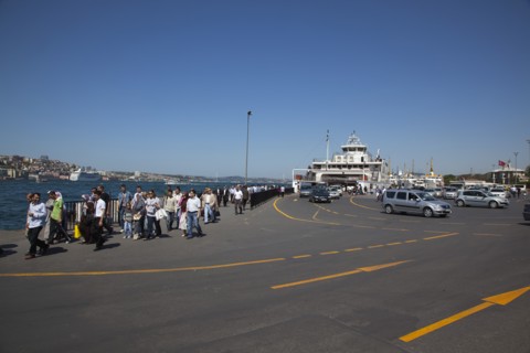 Turkey, Istanbul, Sirkeci ferry terminal with cars and passengers disembarking. 
Photo : Stephen