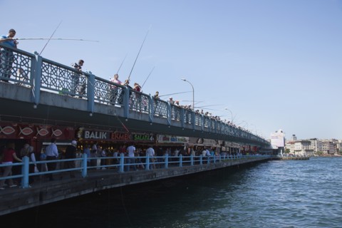Turkey, Istanbul, Galata Bridge people fishing. 
Photo : Stephen Rafferty