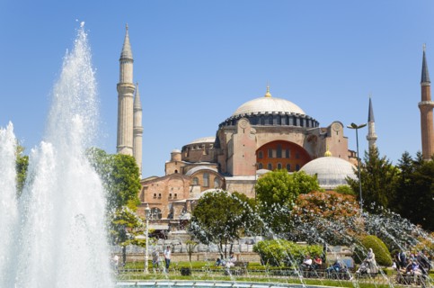 Turkey, Istanbul, Sultanahmet Haghia Sophia with dome and minarets beyond the water fountain in the
