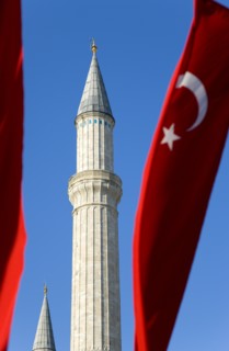 Turkey, Istanbul, Sultanahmet Haghia Sophia minaret and Turkish red flag with white crescent moon