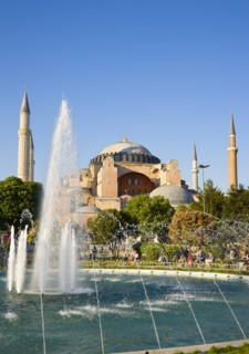 Turkey, Istanbul, Sultanahmet Haghia Sophia with dome and minarets beyond the water fountain in the
