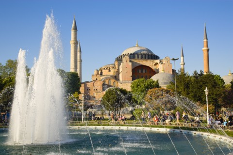 Turkey, Istanbul, Sultanahmet Haghia Sophia with dome and minarets beyond the water fountain in the