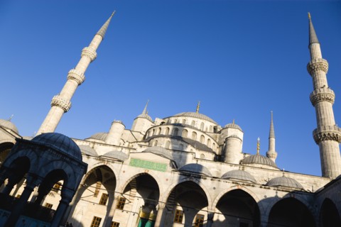 Turkey, Istanbul, Sultanahmet Camii The Blue Mosque domes seen from the Courtyard with Arabic text