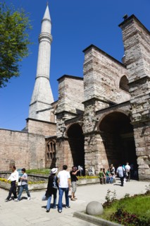 Turkey, Istanbul, Sultanahmet Haghia Sophia Minaret with sightseeing tourists entering the Outer
