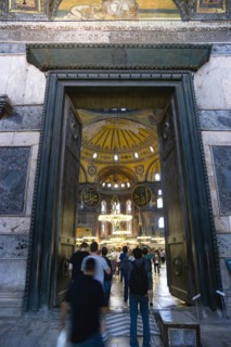 Turkey, Istanbul, Sultanahmet Haghia Sophia People walking through the Imperial Gate with mosaics