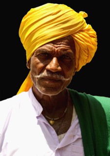 PORTRAIT OF A LAMBANI GYPSY TRIBAL MAN WITH TRADITIONAL TURBAN COSTUME, INDIA. (MR)