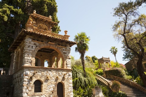Italy, Sicily, Taormina, Via Bagnoli Croce Villa Comunale A building in Trevelyan Public Gardens.