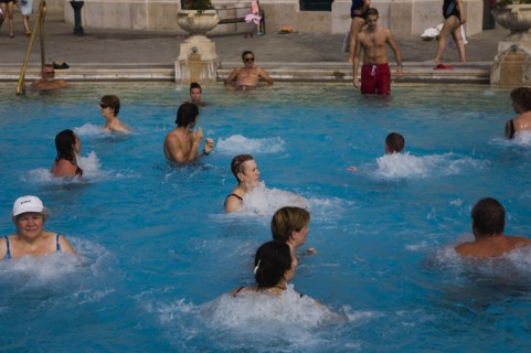 Pest Mixed group outdoor bathing in summer at Szechenyi thermal baths largest in Europe.