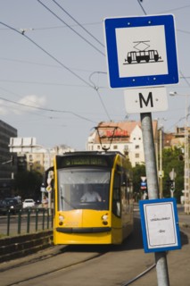 Tram arriving at stop in Pest city centre.