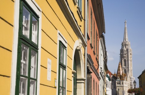 Buda Castle District: Matyas Church viewed from street of restored facades.