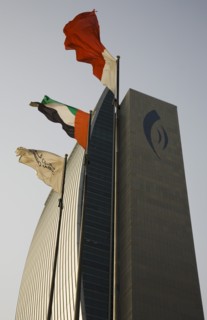 National Bank of Dubai building with flags overlooking the Creek.