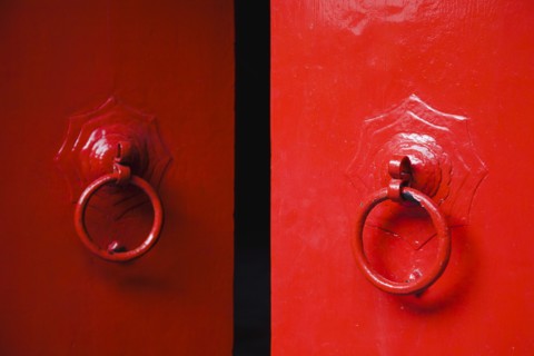 Temple doors painted bright red an auspicious colour.