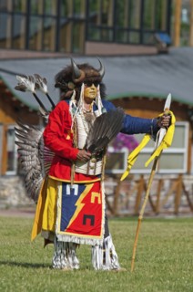 Blackfoot dancer in a buffalo headdress at the Blackfoot Arts & Heritage Festival Pow Wow organized by Parks Canada and the Blackfoot Canadian Cultural Society.