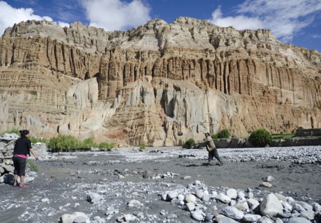 Chhusang locals use appropriate stones from the Kali Gandaki riverbed to rebuild the stone wall around the village.