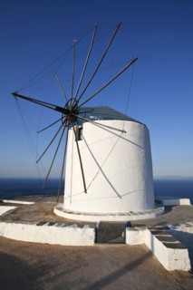 Old wind mill which is now converted to accomodation on the top of a cliff.